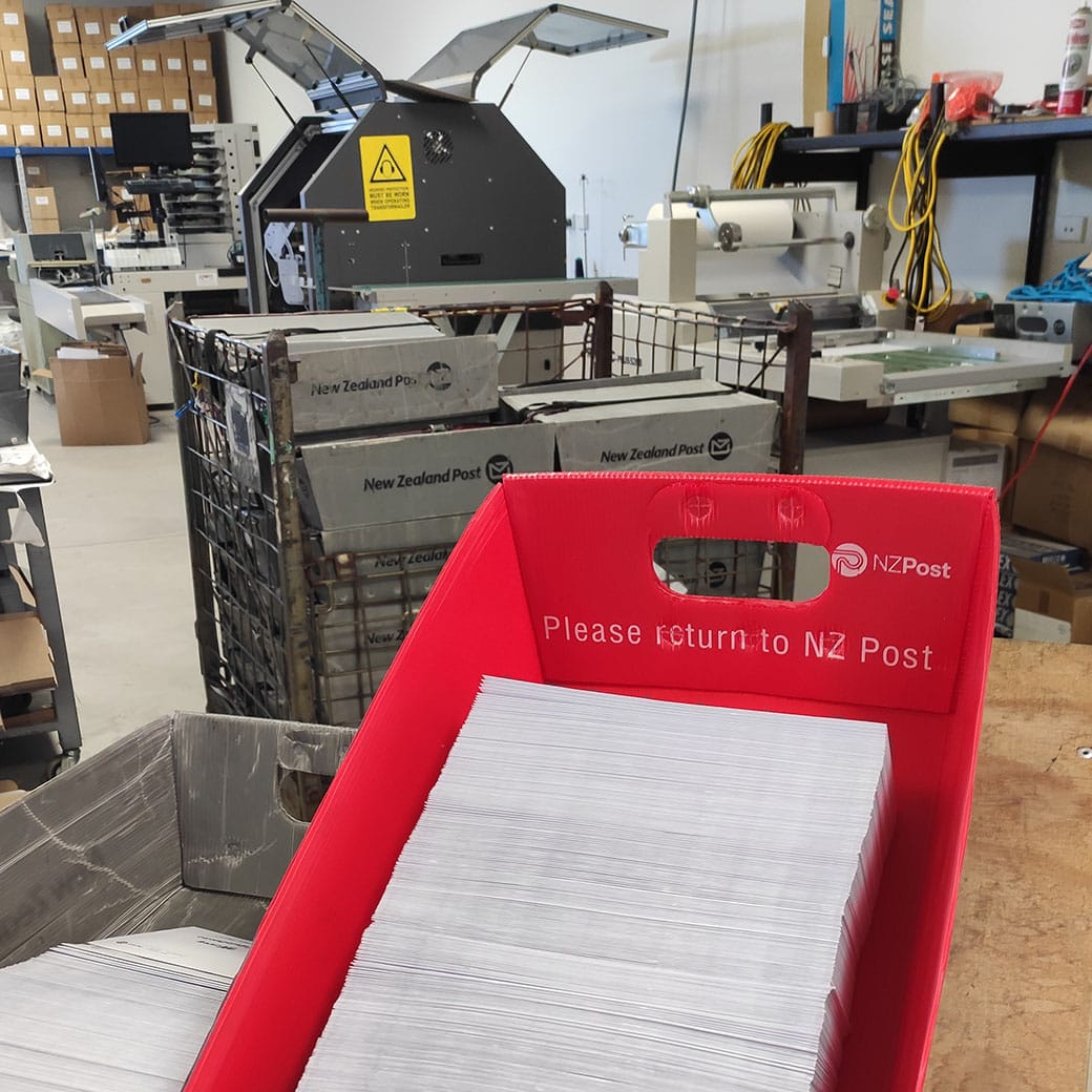 Mail sorted into NZ Post trays ready for bulk lodgement